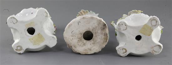 Three early Derby candlestick groups, c.1758-60, 22.5cm and 23.5cm, restoration